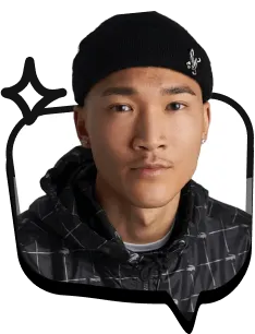 Rankselite SEO Agency A person wearing a black beanie with a small embroidered design and a black patterned jacket is looking directly at the camera with a neutral expression, perhaps pondering e-commerce SEO tips. Their background is plain white.