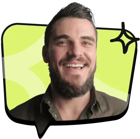 Rankselite SEO Agency A man with short dark hair and a beard smiles warmly. He wears a dark button-up shirt. Behind him is a light green background with abstract patterns and a small star symbol to the upper right of his head, subtly hinting at his expertise in sell strategy.